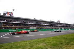 Pole-sitter Sebastian Vettel, Ferrari SF70H, lines-up ahead of Max Verstappen, Red Bull Racing RB13,