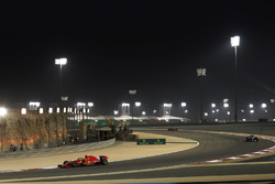 Sebastian Vettel, Ferrari SF71H, leads Valtteri Bottas, Mercedes AMG F1 W09, and Kimi Raikkonen, Ferrari SF71H