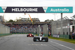 Lewis Hamilton, Mercedes AMG F1 W09, celebrates taking pole position on the pit straight
