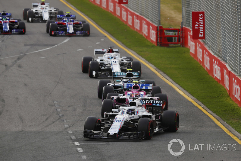 Lance Stroll, Williams FW41 Mercedes, Esteban Ocon, Force India VJM11 Mercedes, y Valtteri Bottas, Mercedes AMG F1 W09