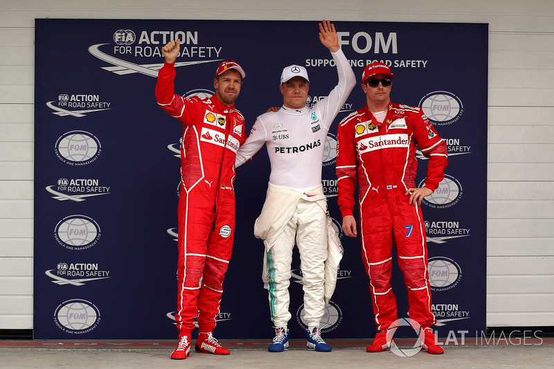 Top 3 Qualifiche: il poleman Valtteri Bottas, Mercedes AMG F1, il secondo qualificato Sebastian Vettel, Ferrari, il terzo qualificato Kimi Raikkonen, Ferrari