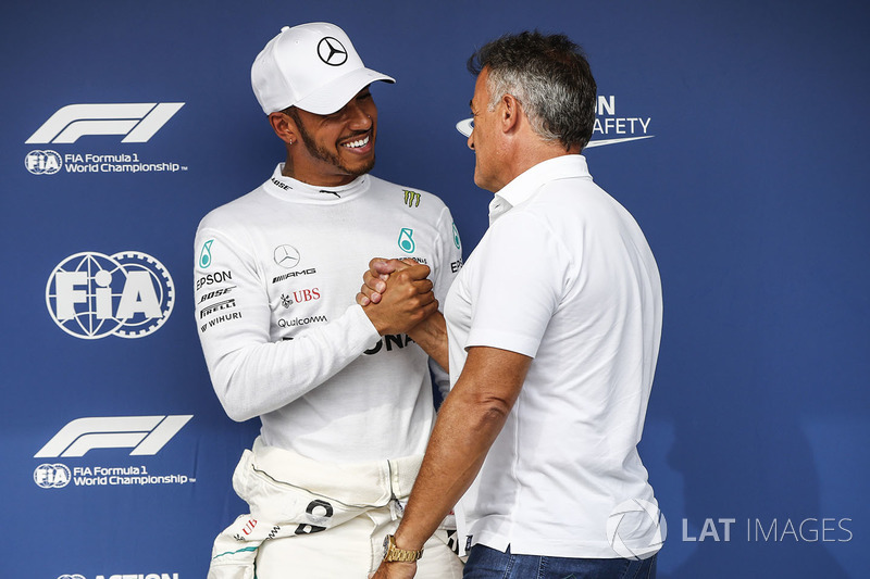 Jean Alesi congratulates Lewis Hamilton, Mercedes AMG F1, on pole