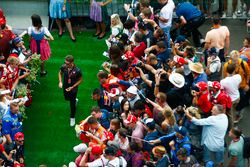 Romain Grosjean, Haas F1 Team, signs autographs for fans