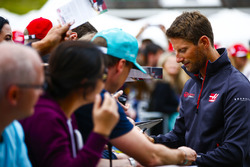 Romain Grosjean, Haas F1 Team, signs autographs for fans