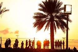 Fans enjoy the sun set