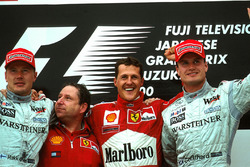 Podium: Mika Hakkinen second , Jean Todt, race winner Michael Schumacher, Ferrari F1 2000 and David