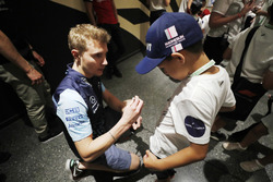 Sergey Sirotkin, Williams Racing, signs autographs for the grid kids