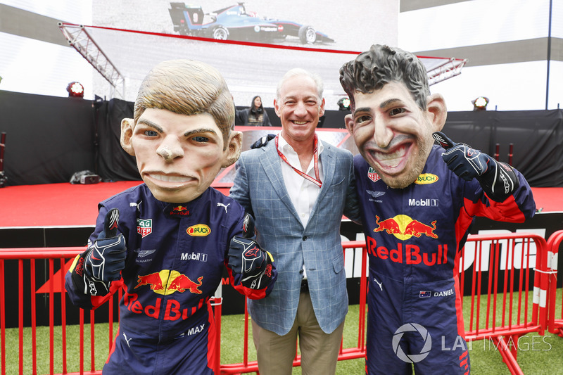 Greg Maffei, Chief Executive Officer, Liberty Media, with caricatures of Max Verstappen, Red Bull Racing, and Daniel Ricciardo, Red Bull Racing