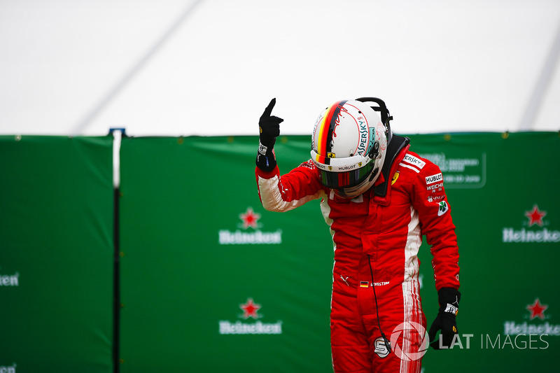 Sebastian Vettel, Ferrari, celebrates victory in parc ferme