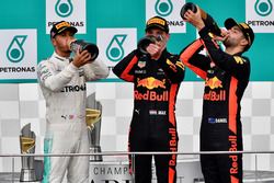 Lewis Hamilton, Mercedes AMG F1, Max Verstappen, Red Bull Racing and Daniel Ricciardo, Red Bull Racing celebrate on the podium, the champagne