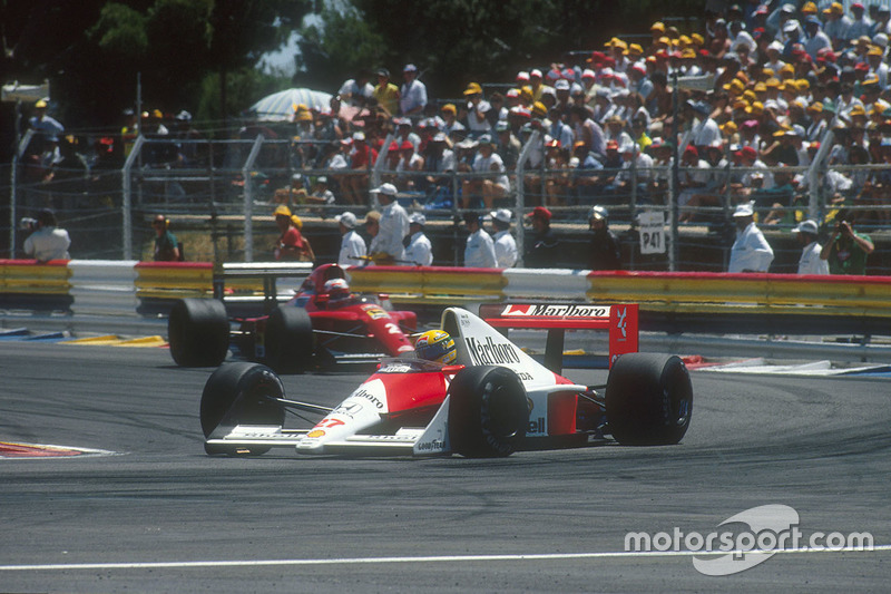 Ayrton Senna, McLaren MP4/5B Honda with Nigel Mansell, Ferrari 641 behind