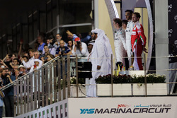 The podium: Nico Rosberg, Mercedes AMG F1, second and World Champion; Lewis Hamilton, Mercedes AMG F1, race winner; Sebastian Vettel, Ferrari, third