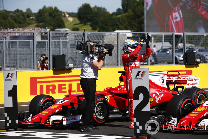 Ganador de la pole Sebastian Vettel, Ferrari