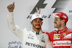 Lewis Hamilton, Mercedes AMG, second place, Sebastian Vettel, Ferrari, race winner, on the podium
