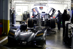 Mechanics working of the #70 Mazda Motorsports Mazda DPi: Joel Miller, Tom Long, James Hinchcliffe