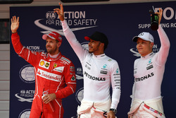Sebastian Vettel, Ferrari, polesitter Lewis Hamilton, Mercedes AMG F1 and Valtteri Bottas, Mercedes