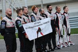 The Toyota Racing team display a message to Audi on the grid