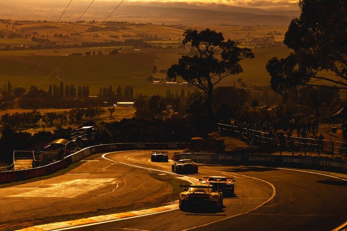 Track action at sunset