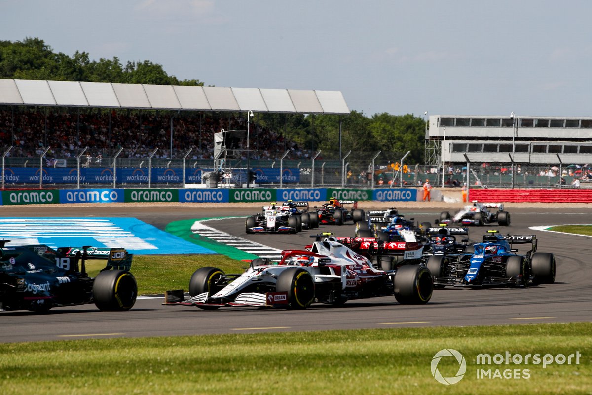 Lance Stroll, Aston Martin AMR21, Kimi Raikkonen, Alfa Romeo Racing C41, Antonio Giovinazzi, Alfa Romeo Racing C41, and Esteban Ocon, Alpine A521