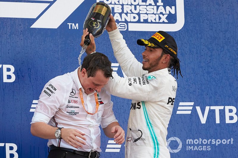 Lewis Hamilton, Mercedes AMG F1, 1st position, pours Champagne over Fred Judd, Chief Engineer Trackside, Mercedes AMG F1, on the podium