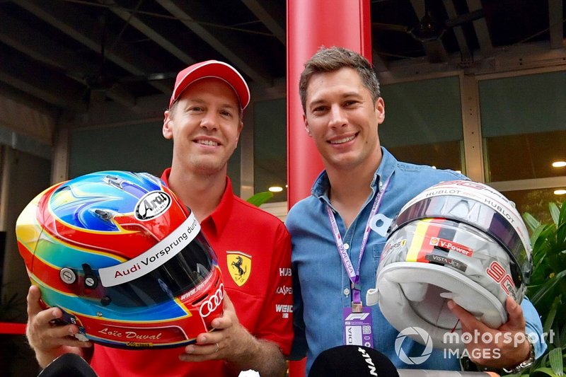 Sebastian Vettel, Ferrari and Loic Duval helmet swap