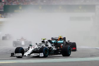 Valtteri Bottas, Mercedes AMG W10, leads Pierre Gasly, Red Bull Racing RB15