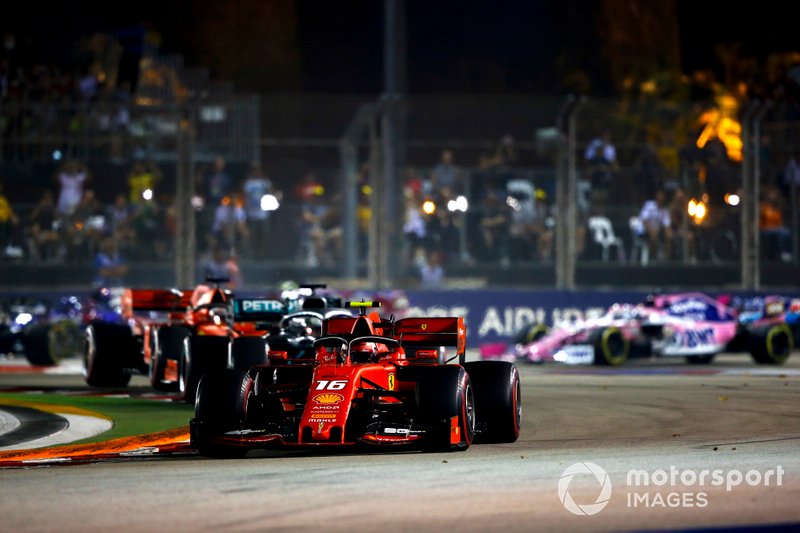 Charles Leclerc, Ferrari SF90, leads Lewis Hamilton, Mercedes AMG F1 W10, Sebastian Vettel, Ferrari SF90, Max Verstappen, Red Bull Racing RB15, and the rest of the field at the start