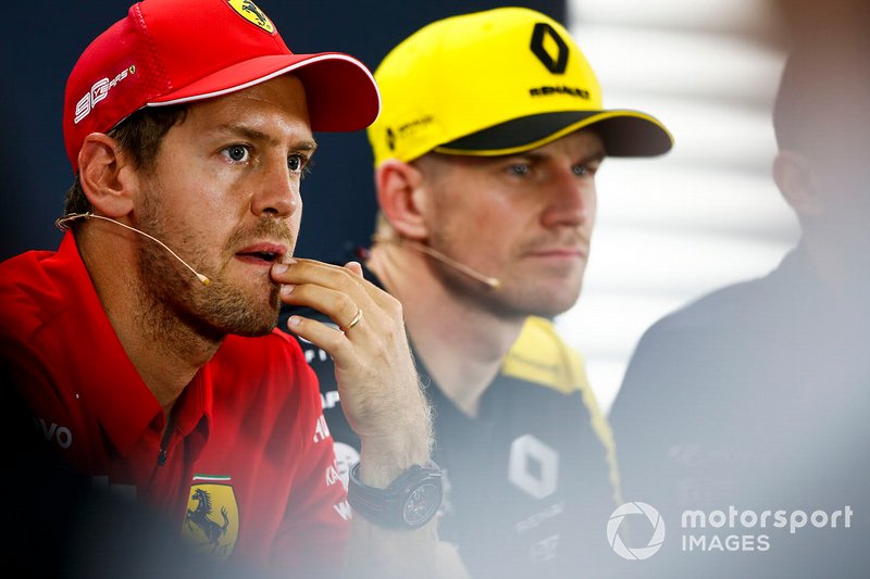 Sebastian Vettel, Ferrari y Nico Hulkenberg, Renault F1 Team en la conferencia de prensa