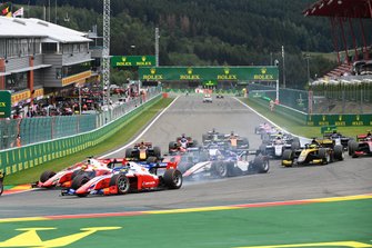 Mick Schumacher, Prema Racing, leads Robert Shwartzman, Prema Racing, Louis Deletraz, Charouz Racing System, Nobuharu Matsushita, MP Motorsport, and the remainder of the field at the start