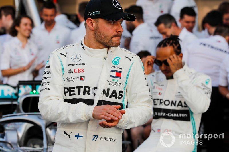 Lewis Hamilton, Mercedes AMG F1, poses for a group photo with Valtteri Bottas, Mercedes AMG F1