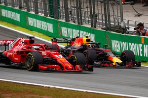 Max Verstappen, Red Bull Racing RB14, overtakes Sebastian Vettel, Ferrari SF71H. 