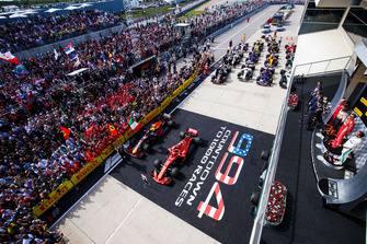 Max Verstappen, Red Bull Racing, 2nd position, Kimi Raikkonen, Ferrari, 1st position, and Lewis Hamilton, Mercedes AMG F1, 3rd position, on the podium