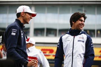 Esteban Ocon, Racing Point Force India and Lance Stroll, Williams Racing laughing Andy Hone