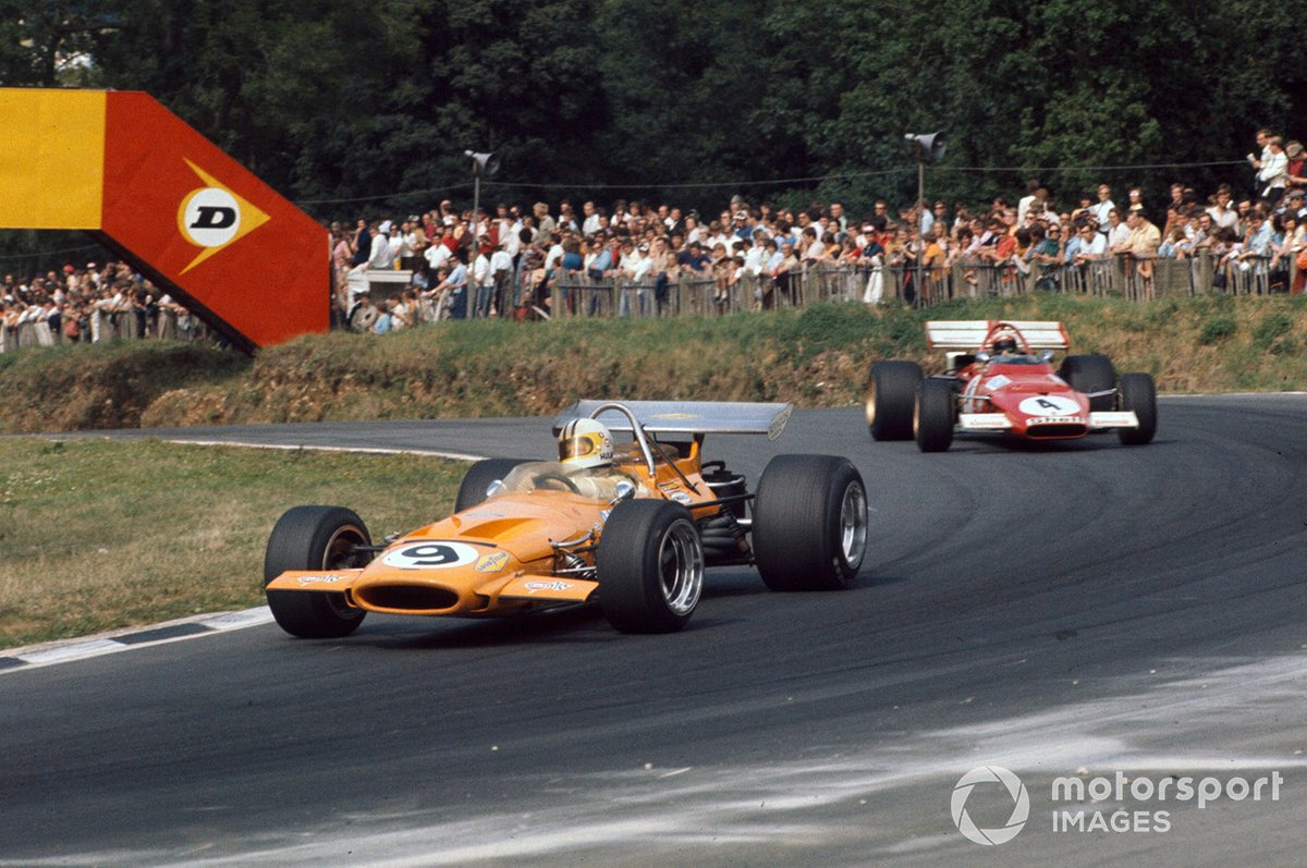 Denny Hulme, McLaren M14A Ford leads Clay Regazzoni, Ferrari 312B