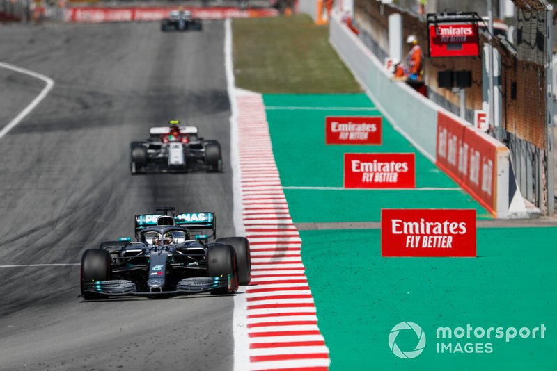 Lewis Hamilton, Mercedes AMG F1 W10, leads Antonio Giovinazzi, Alfa Romeo Racing C38