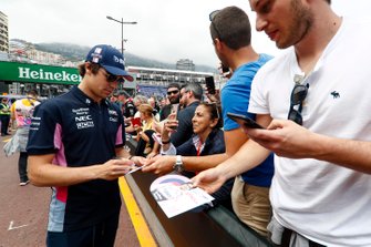 Lance Stroll, Racing Point signs a autograph for a fan