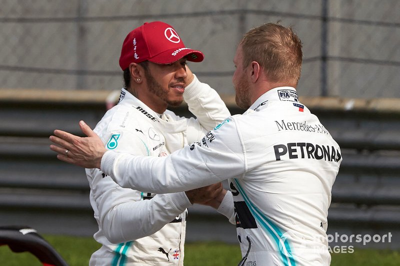 Lewis Hamilton, Mercedes AMG F1, and pole man Valtteri Bottas, Mercedes AMG F1, congratulate each other