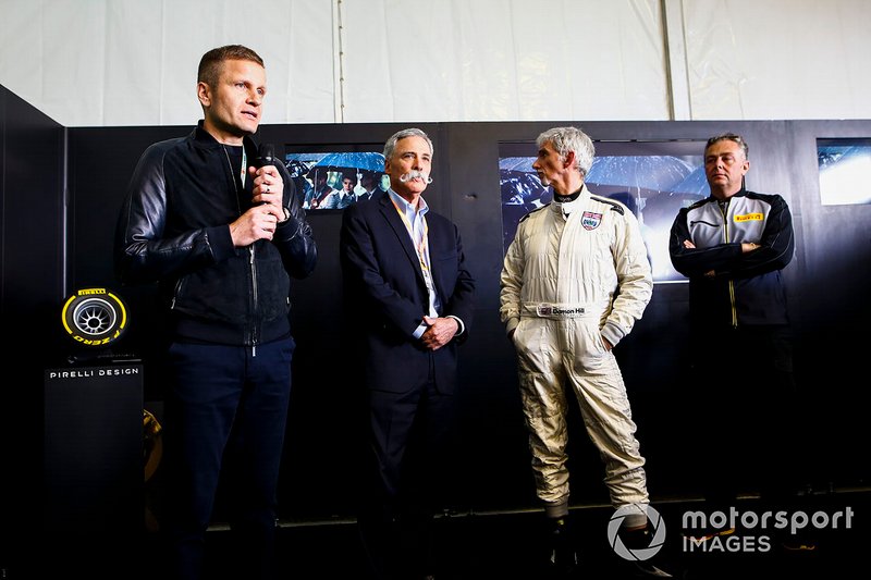 Chase Carey, Damon Hill y Mario Isola, Pirelli Motorsport