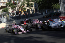 Sergio Perez, Sahara Force India VJM10 and Esteban Ocon, Sahara Force India VJM10 at the restart