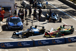 Sébastien Buemi, Renault e.Dams, and Daniel Abt, ABT Schaeffler Audi Sport, leave the pits