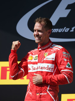 Podium: race winner Sebastian Vettel, Ferrari