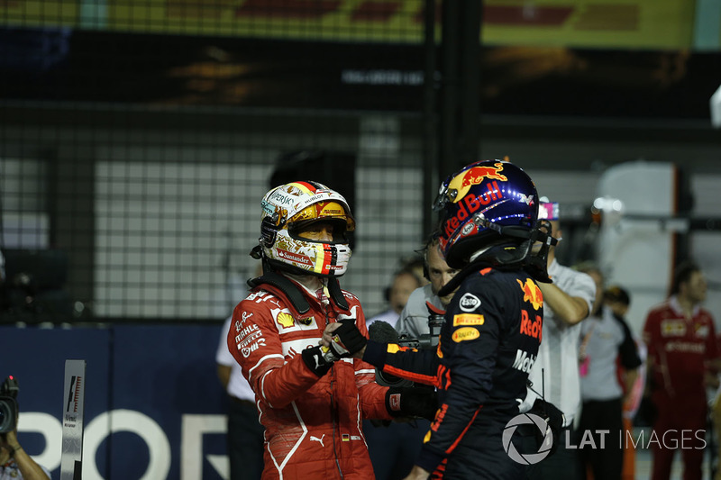 Il Poleman Sebastian Vettel, Ferrari, festeggia nel parco chiuso, Max Verstappen, Red Bull Racing