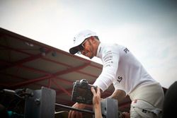 Race winner Lewis Hamilton, Mercedes AMG F1, celebrates victory with the fans