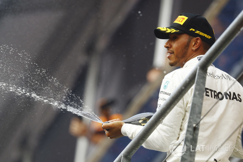 Podium: Race winner  Lewis Hamilton, Mercedes AMG, sprays champagne