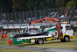 The crashed car of Romain Grosjean, Haas F1 Team VF-17 is recovered in Q1