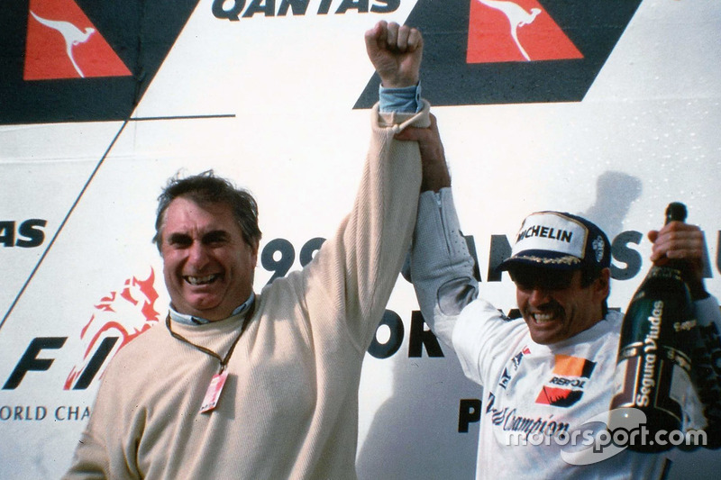 Podium: race winner Mick Doohan, Honda and Dr. Claudio Costa