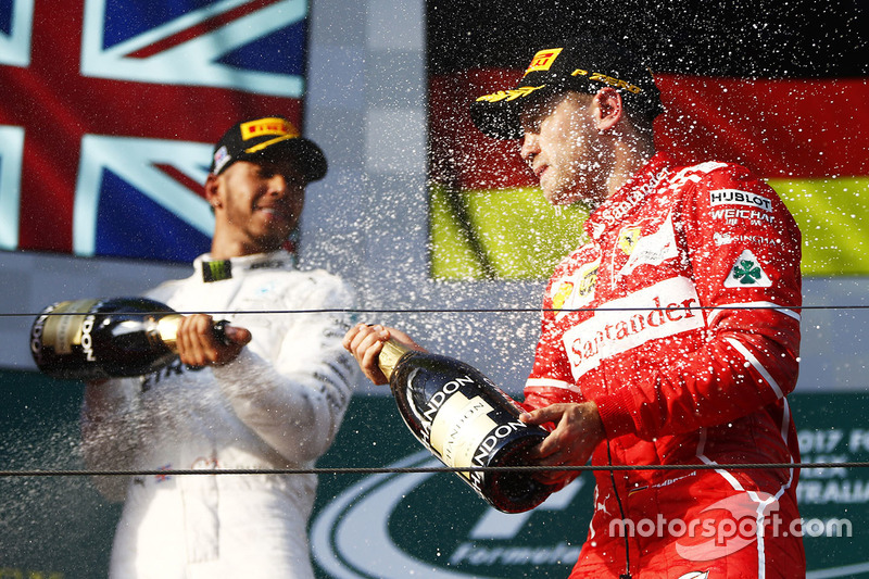 Podium: winner Sebastian Vettel, Ferrari, second place Lewis Hamilton, Mercedes AMG F1