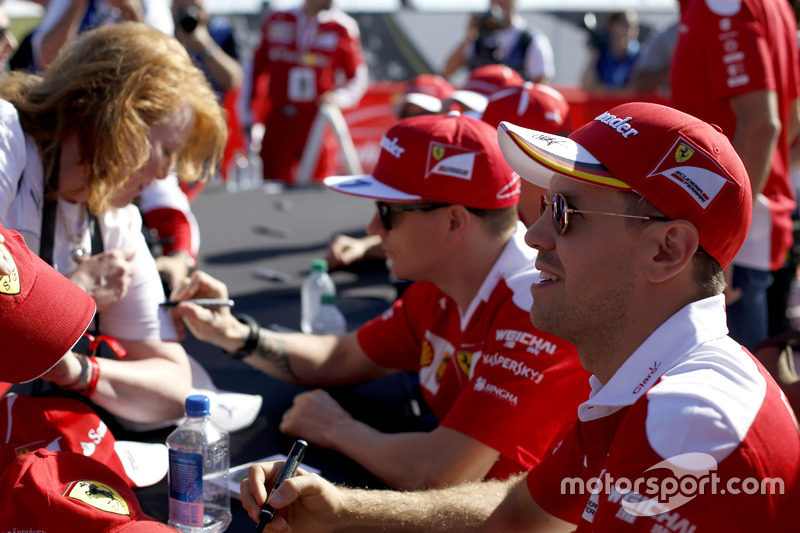 Kimi Raikkonen, Ferrari and Sebastian Vettel, Ferrari