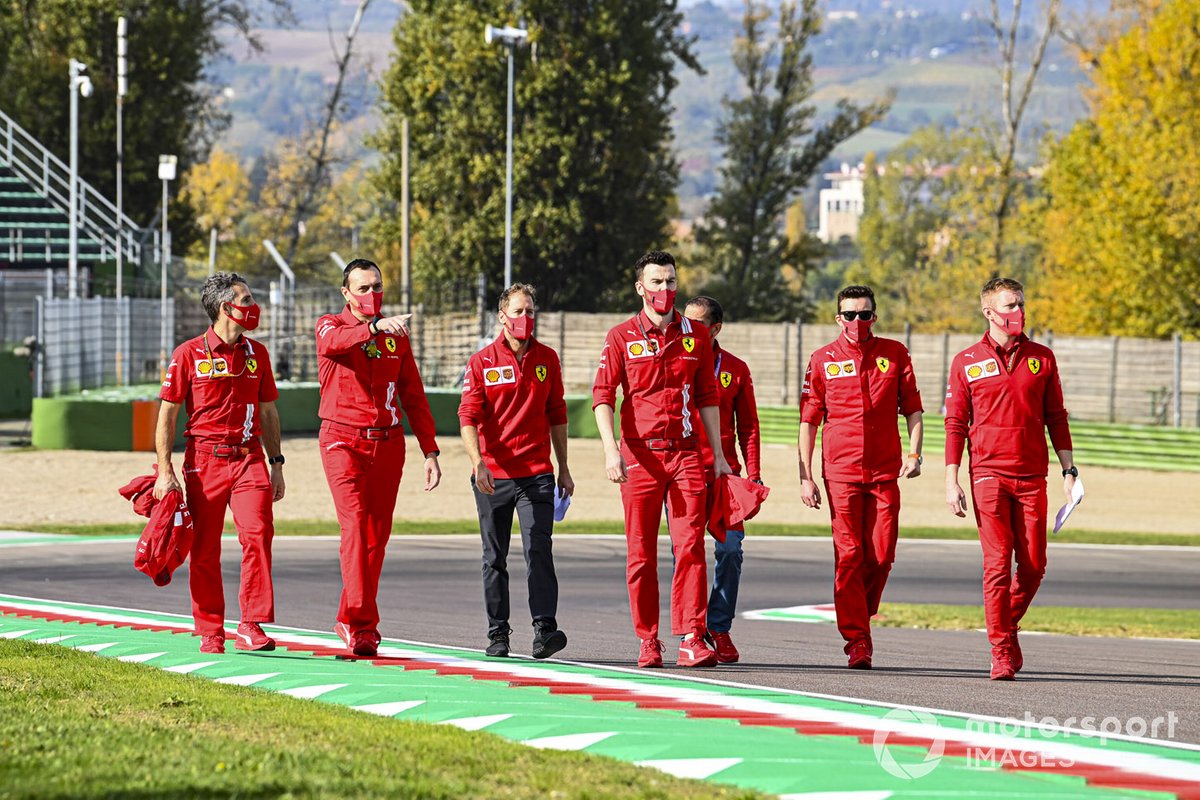 Sebastian Vettel, Ferrari, walks the track with Marc Gene, reserve driver, Ferrari and other team mates