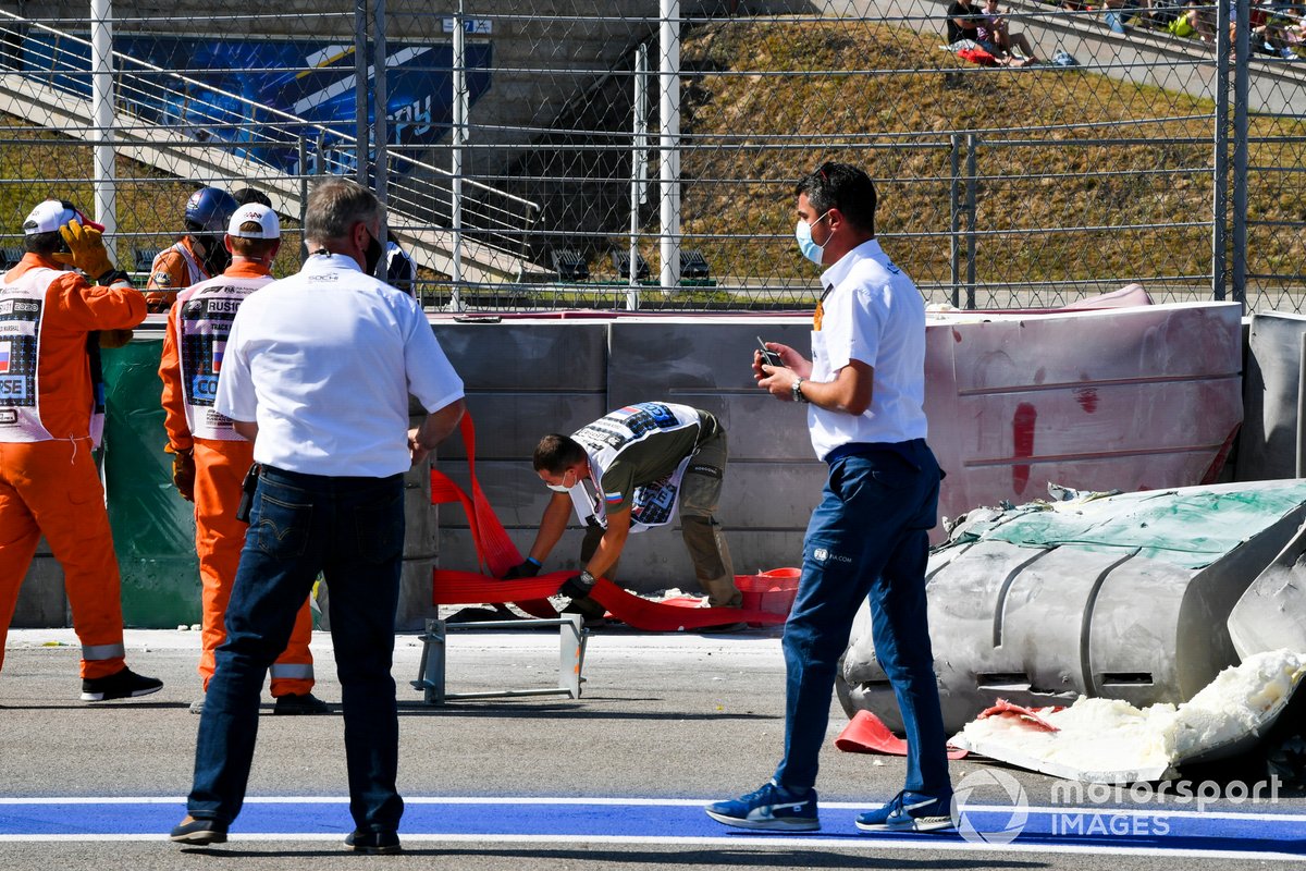 Michael Masi, Race Director with marshals recovering the car of Jack Aitken, Campos Racing after crashing with Luca Ghiotto, Hitech Grand Prix